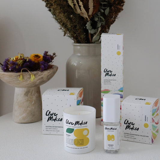 Full Clare Makes Henry candle, room spray and diffuser range with The Wattle scent, styled with matching packaging