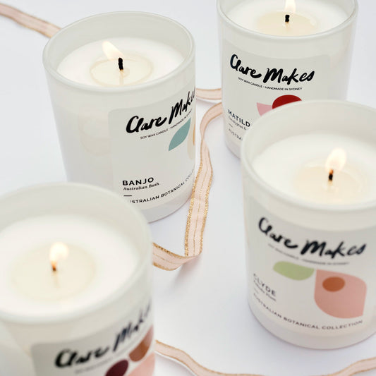 Clare Makes Medium Candles in white glass jars with cotton wicks