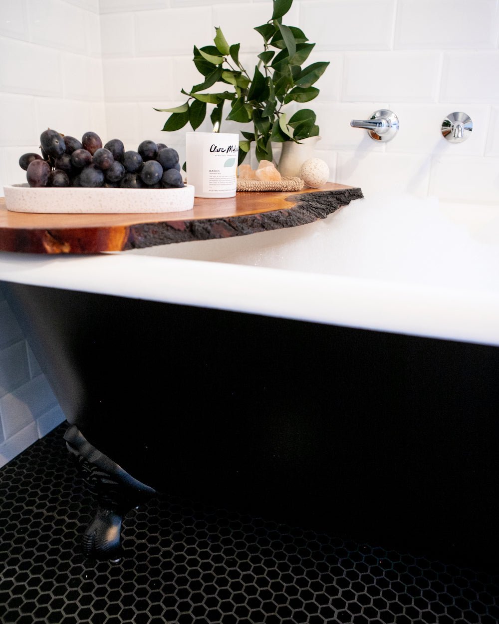 Clare Makes Banjo candle in a spa setting - Australian bush scent with patchouli and sandalwood