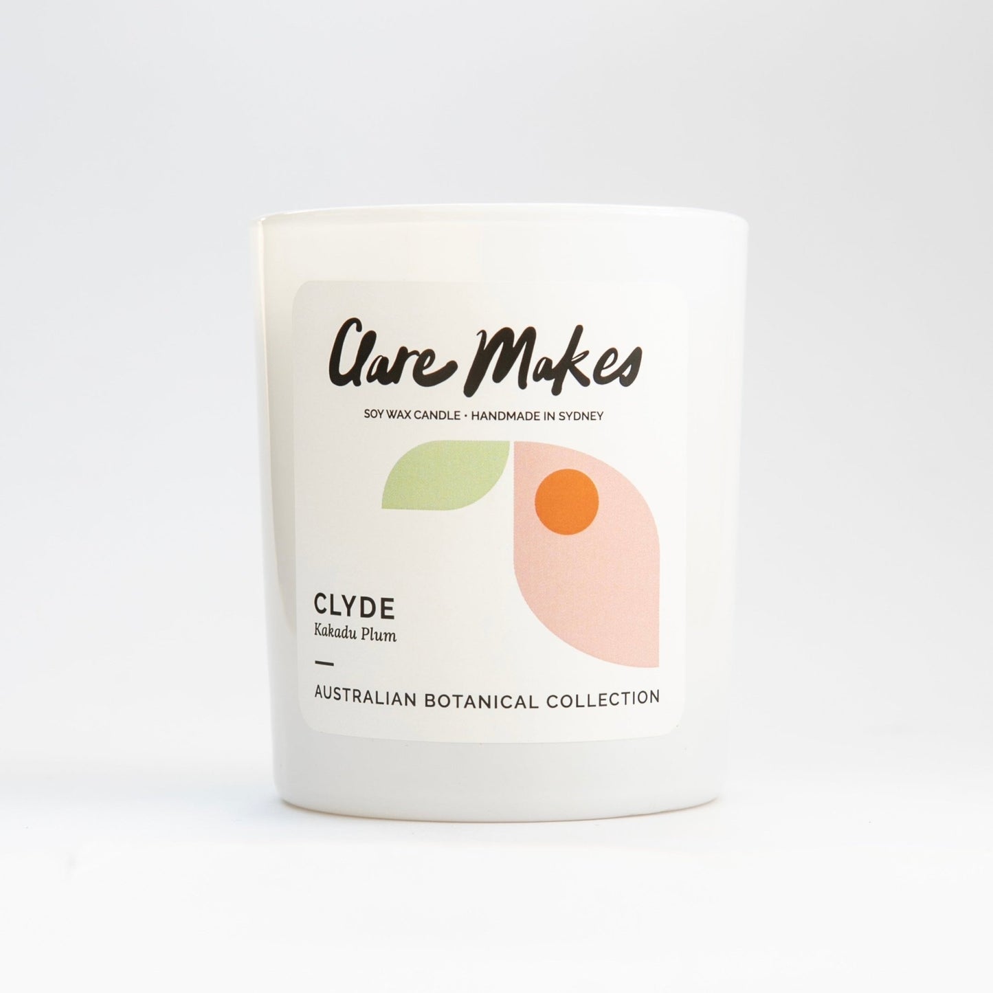 Kakadu Plum candle by Clare Makes in minimalist white setting