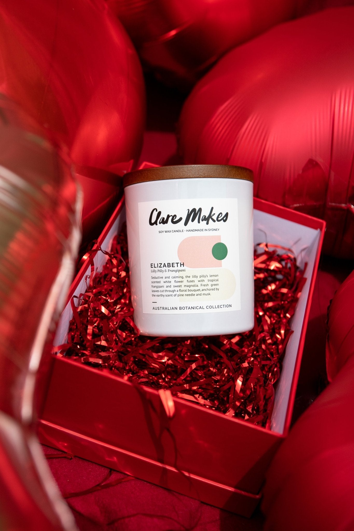 Elizabeth candle by Clare Makes in red festive gift packaging