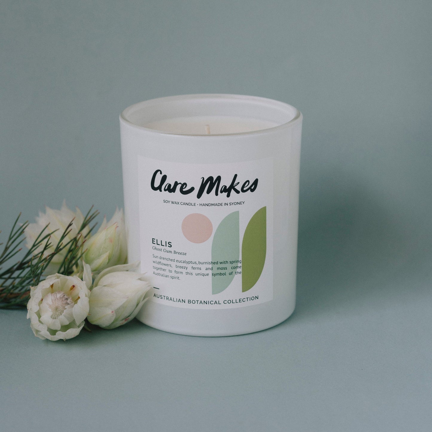 Ellis: Ghost Gum Breeze candle by Clare Makes on grey background with minimal styling.