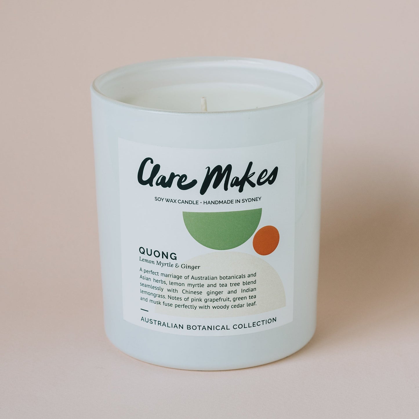 Clare Makes Quong candle in white glass jar labelled Lemon Myrtle & Ginger, part of the Australian Botanical Collection