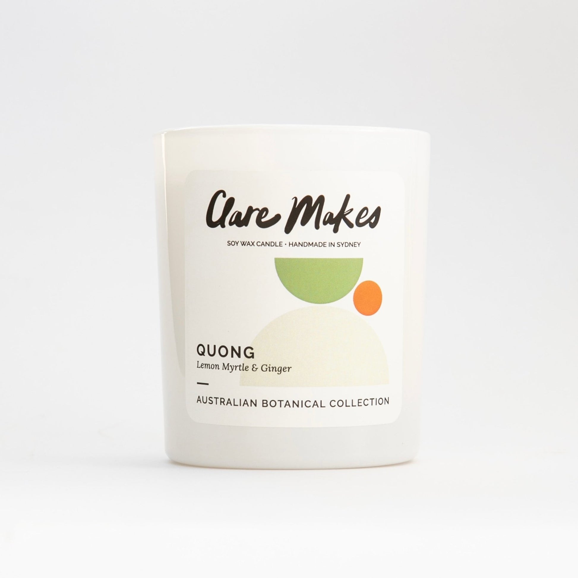 Clare Makes Quong candle in white glass jar labelled Lemon Myrtle & Ginger, part of the Australian Botanical Collection