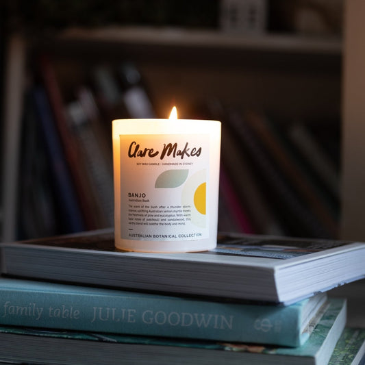 Banjo: Australian Bush candle styled in moody lighting - earthy and fresh scent by Clare Makes