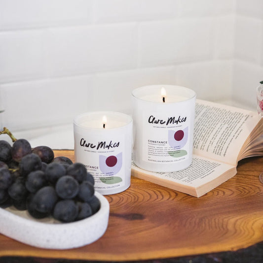 Styled image of Constance: Eucalyptus & Lavender candle on timber with soft light