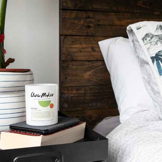 Clare Makes Quong candle in white glass jar labelled Lemon Myrtle & Ginger, part of the Australian Botanical Collection